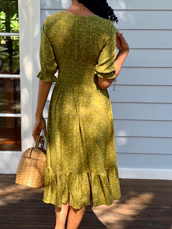 Moss Green vintage inspired dress with vintage florals, features short sleeves and knee length, smock elastic at bust to waist line