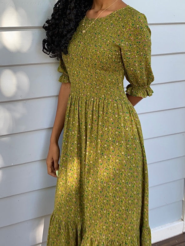 Moss Green vintage inspired dress with vintage florals, features short sleeves and knee length, smock elastic at bust to waist  line