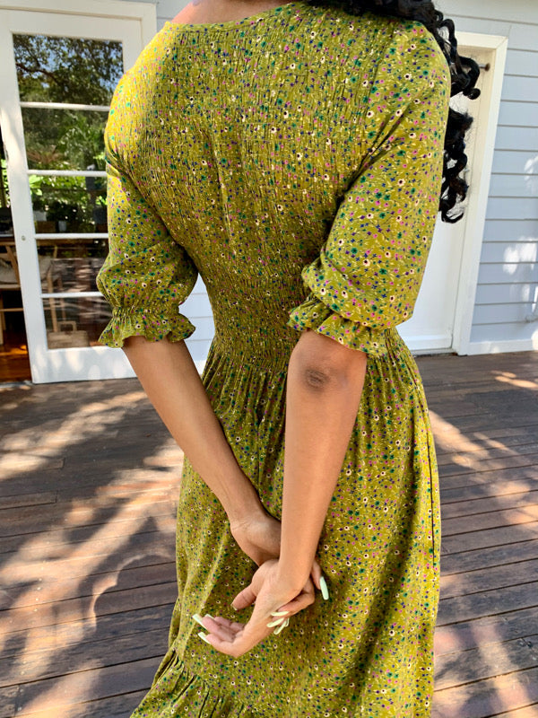 Moss Green vintage inspired dress with vintage florals, features short sleeves and knee length, smock elastic at bust to waist line