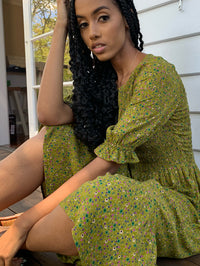 Moss Green vintage inspired dress with vintage florals, features short sleeves and knee length, smock elastic at bust to waist line