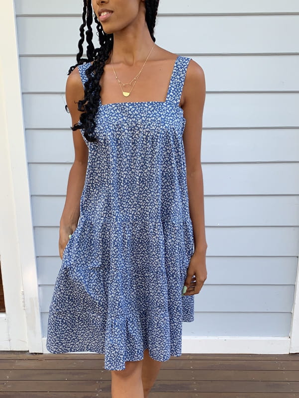 Lucia vintage inspired knee length cotton dress with blue floral print and dress has pockets