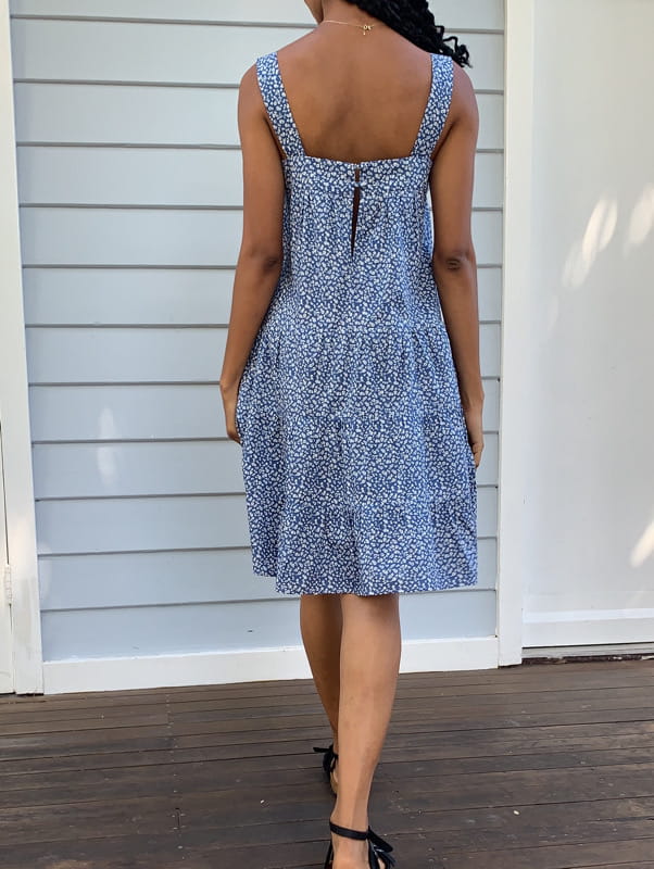 Lucia is a vintage inspired cotton dress with pockets and blue floral print
